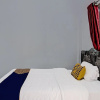 Отель Spot On 91699 Homestay Hj Lela Syariah, фото 11