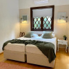 Отель Apartamento do Lago, jardim, condomínio completo, фото 7
