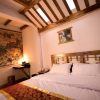 Отель Zhangjiajie Tujia Theme Hostel, фото 4