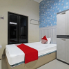 Отель OYO 91202 Family Guest House Syariah, фото 6