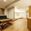 Отель OOKINI HOTELS Yotsubashi Horie Apartment, фото 4