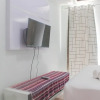 Отель Simple And Homey Studio At Tamansari Mahogany Karawang Apartment, фото 13