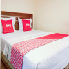 Отель OYO 90002 Wisma Robinson, фото 3