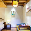 Отель Lijiang Shuhe Jinhaitang Inn, фото 14