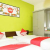 Отель OYO 365 Tya Family Guest House Syariah, фото 3