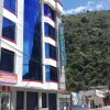 Отель Club Ejecutivo Hotel Баньос
