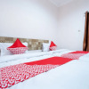 Отель Art Guest House Syariah by OYO Rooms, фото 7