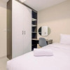 Отель Homey And Minimalist 2Br Apartment At Nine Residence, фото 4