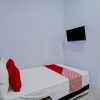 Отель OYO 92817 Niza Guesthouse Syariah, фото 4