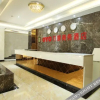 Отель Oyo Xingyi Wanshun Business Hotel, фото 2