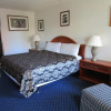 Отель Northwoods Motel, фото 6