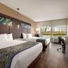 Отель La Quinta Inn & Suites by Wyndham Orlando - IDrive Theme Parks, фото 6