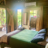 Отель Uvita Oasis Retreat with Villa Cabins and Apartment, фото 3