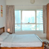 Отель Fully Furnished 1BR with Balcony & Marina View - MRVW, фото 1
