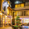 Отель Shifangyuan Holiday Homestay (Taohuajiang Branch, Reed Flute Cave Scenic Area, Guilin), фото 2