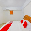 Отель OYO 90967 Soka Asri Guest House, фото 15