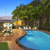 Отель Flynns on Surf Beach Villas, фото 1
