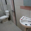 Отель OYO 936 Tremigo Guest House Syariah, фото 6