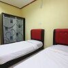 Отель OYO 89819 Raz Hotel Kelulut, фото 11