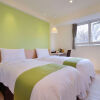 Отель Green Hotel - Fengjia, фото 6