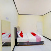 Отель OYO 91171 Vip Homestay Syariah, фото 14