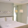 Отель Spacious And Cozy Studio Room At Azalea Suites Apartment, фото 3