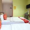 Отель OYO 90964 Melody 88 Inn, фото 7