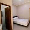 Отель Shofy Guest House Syariah 33 Subang, фото 18