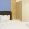 Отель Zest Studio Semi Apartment at The Lodge Paskal near BINUS University, фото 1