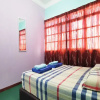 Отель OYO Home 90339 Sosodikon Inap Desa, фото 6