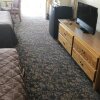 Отель Travelers Inn & Suites, фото 17
