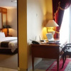 Отель Travellers Suites, фото 10