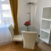 Отель New Gwynn House Sloane Square Apartment в Лондоне