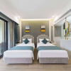 Отель Howard Johnson by Wyndham Lake Serenity Hot Springs Xichang, фото 5