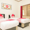 Отель OYO 353 Loesje Guest House Syariah, фото 21