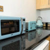 Отель Sleek, Modern and Centrally Located 1bedroom flat with Free WiFi, фото 4