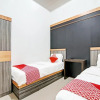 Отель OYO 91324 Aliya Homestay Syariah, фото 13