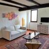 Отель Caslano: 2.5 Zi-Dachwohnung im rustikalen-modernen Stil, фото 2