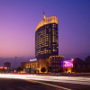 Отель Huaqiao New Century Grand Hotel, фото 1