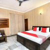 Отель OYO Flagship 808230 Komfort Villa, фото 6