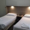 Отель Town and Country Motel, фото 2