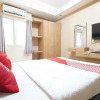 Отель OYO 93547 Metro Suites Apartment By Barbie Homestay, фото 1
