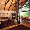 Отель Msunduze River Lodge в Мкузе