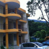 Отель YC's Apartment @ Bayu Emas в Бату Ферринги