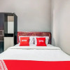 Отель OYO Life 91239 Kost Rosandy House Yogyak, фото 12