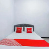 Отель OYO 93976 Maluku Guest House, фото 14