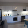 Отель Brand New 2 Bedroom Apartment, фото 4