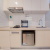 Отель Warm And Comfortable Studio Room At Sky House Bsd Apartment, фото 2