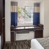 Отель Microtel Inn & Suites by Wyndham Brooksville, фото 7