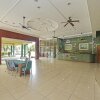 Отель OYO HOME 90700 Teluk Batik Holiday Apartment, фото 31